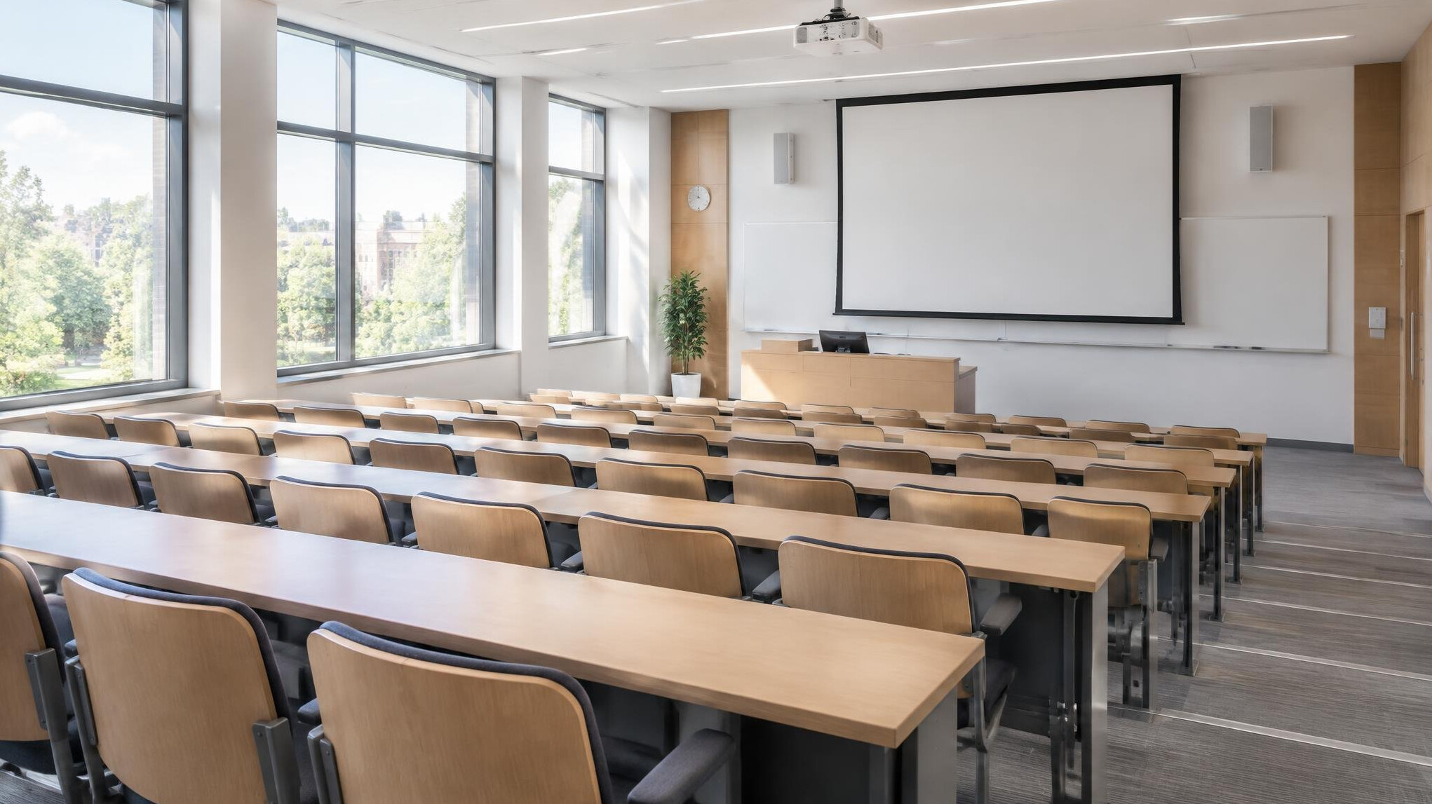 Empty lecture hall with wooden seats